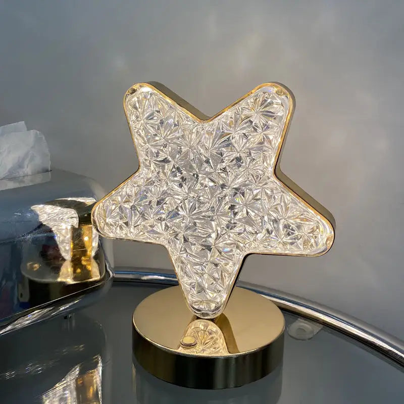 Lampada da tavolo a forma di stella