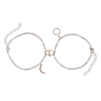 Coppia Bracciali in acciaio con ciondolo (mezzo cuore magnetico)